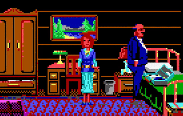 gif of a woman in a room while a man unpacks clothes