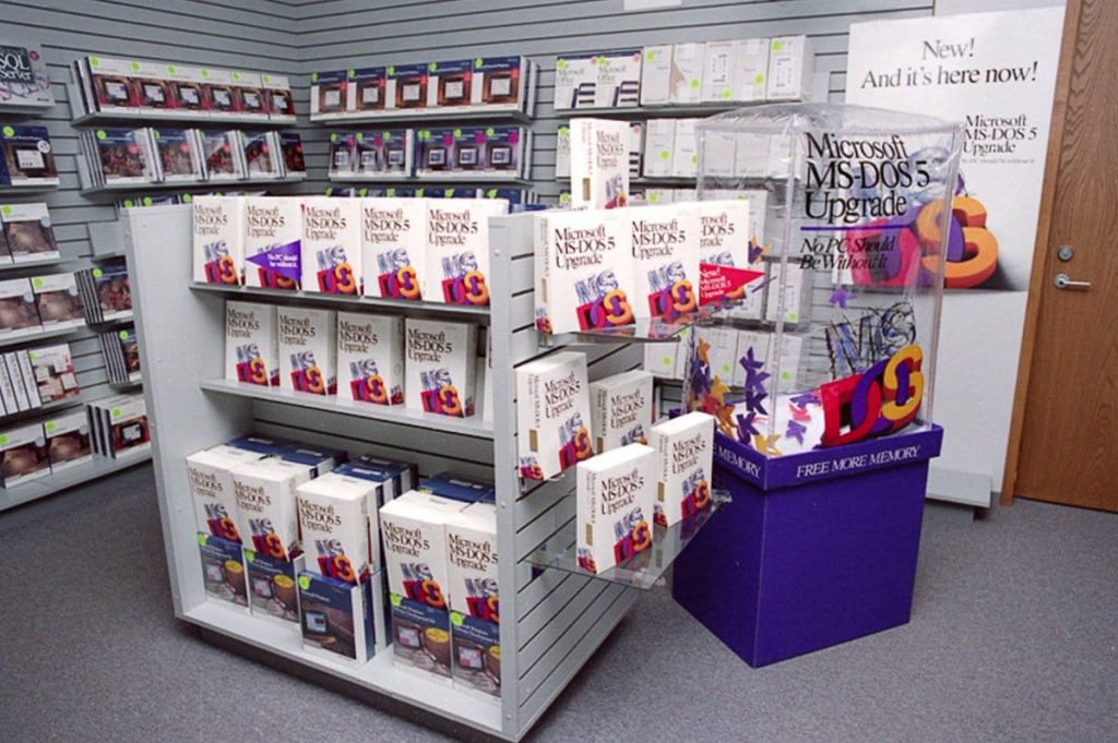 a display of Microsoft MS-DOS 5 Upgrade boxes in a computer store