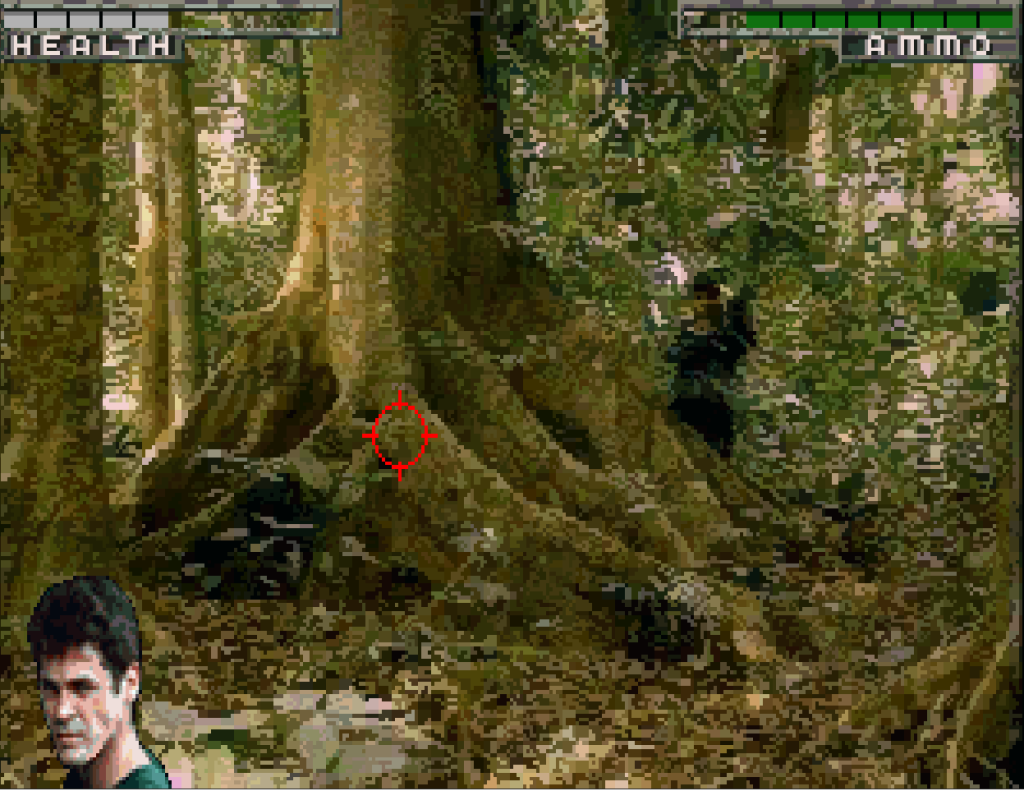 very blurry photo of a forest and guy behind a tree pointing a gun at you