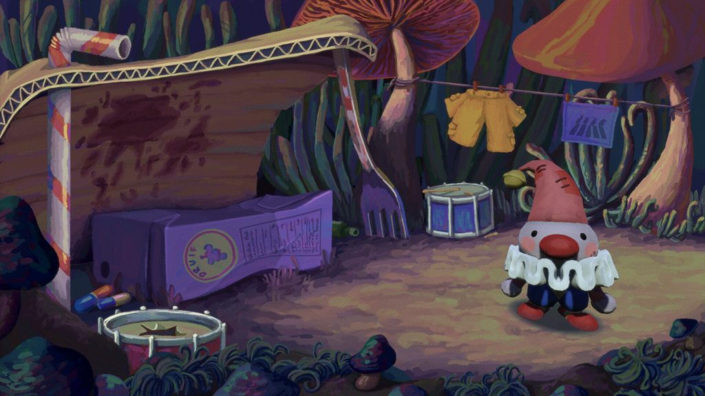 a tiny clown in tall grass with a home made out of household garbage
