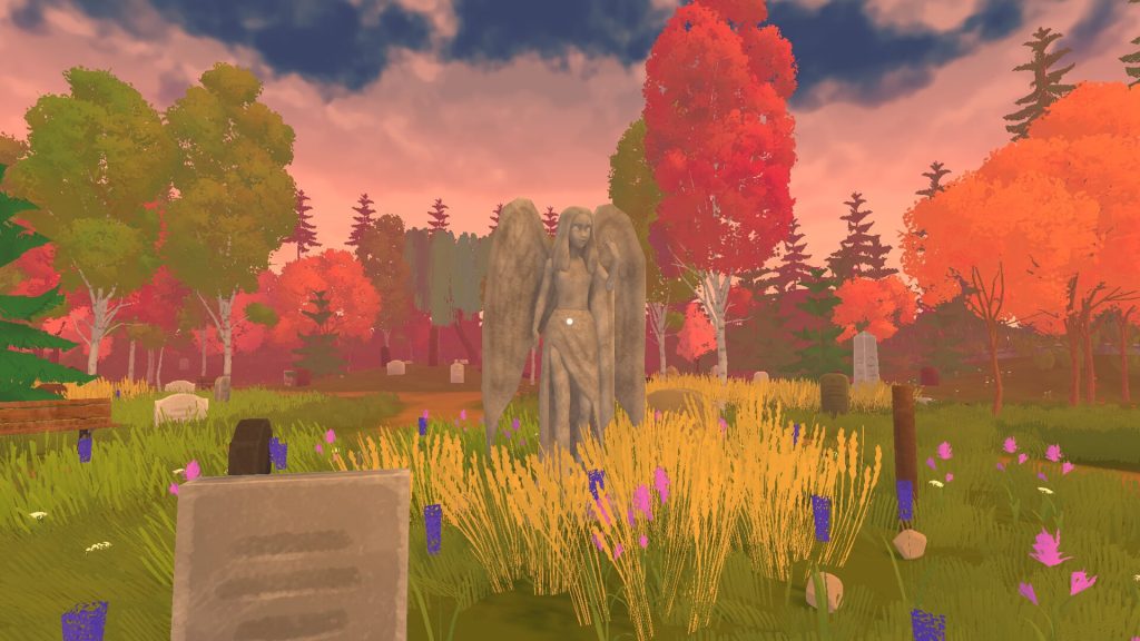 view of a cemetery statue at sunset, probably in the fall