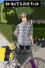 box art of aran's bike trip of a guy standing next to a bike