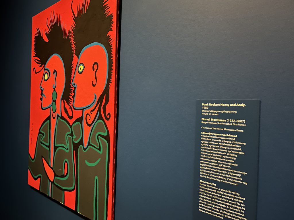 painting of two punk rockers titled Punk Rockers Nancy and Andy by Norval Morrisseau